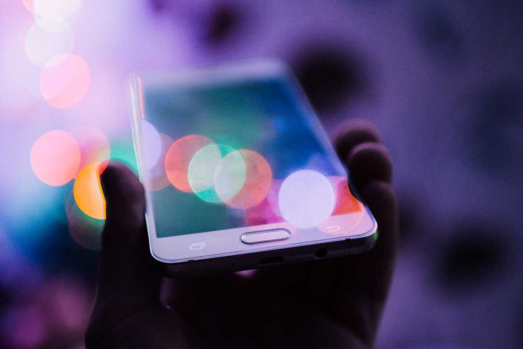 person-holding-smartphone-0vgg7cqtwco